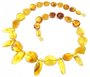 Beads made of figured amber stones